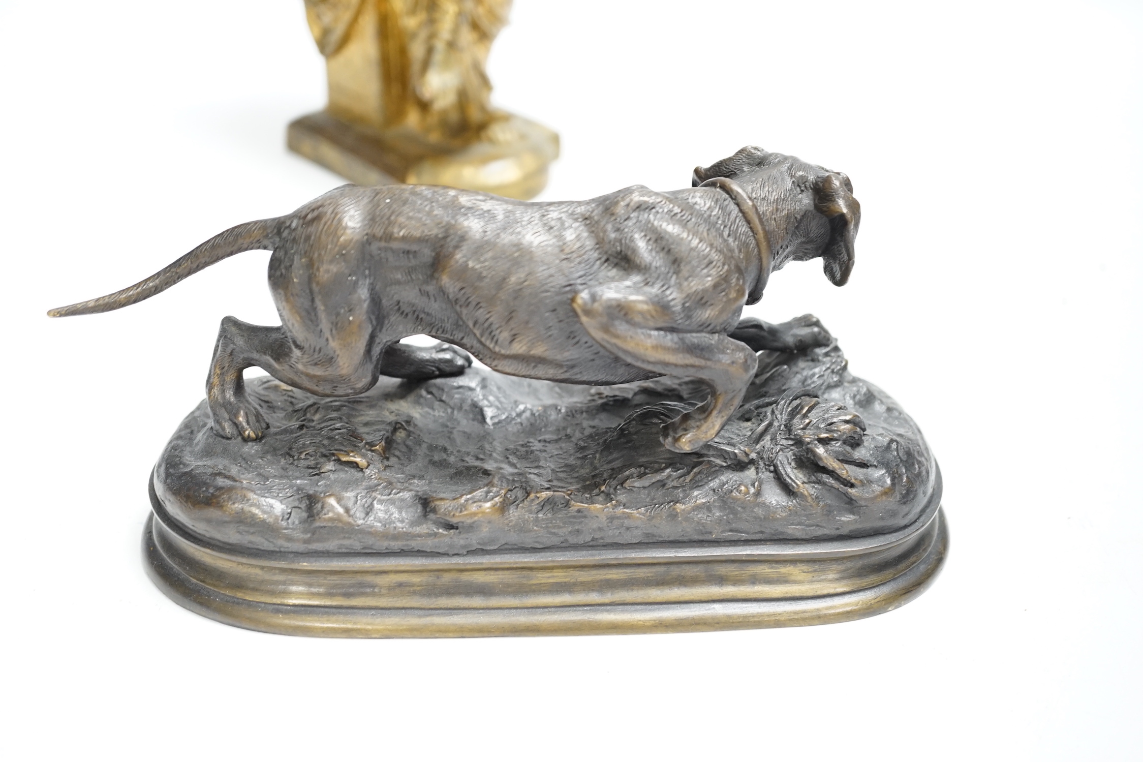 A gilt metal classical figure and a bronze of a dog, 26cm high